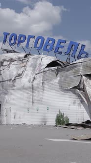 Vertical Video of a Burnt Shopping Center During the War in Bucha Ukraine alt