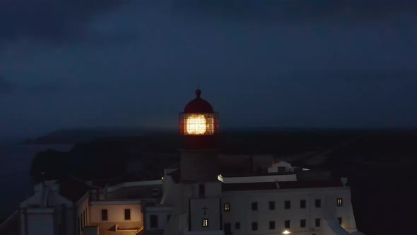 Amazing Aerial View of Historic Lighthouse in Lagos Algarve Portugal Circle Pan Dolly Out Reveal alt