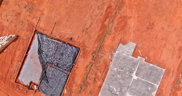 Laying Installation of Underground Utilities in a Drainage Plastic Pipe of Pipework Being Covered in alt