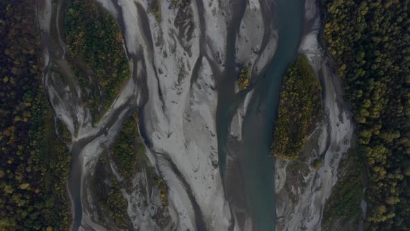 Aerial view Laba river flood forest at dawn, autumn, natural water earth patterns, Caucasus Russia
