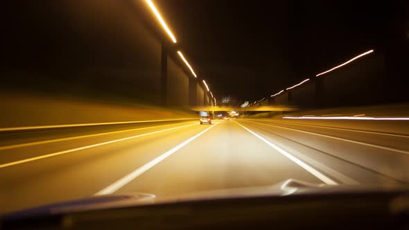 Timelapse of a car driving at night