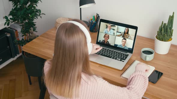 Online Group Video Call Conference of Work Team From Home Office on Laptop