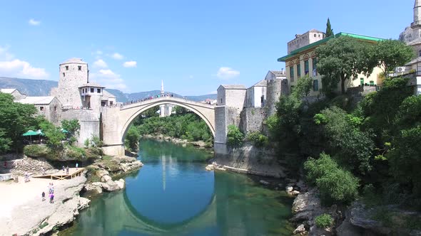 Flying away from bridge in Mostar, Bosnia and Herzegovina alt