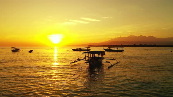 Wide drone island view of a white paradise beach and aqua turquoise water background alt