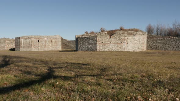GAMZIGRAD, SERBIA - DECEMBER 25, 2017 Protecting walls outside the Felix Romuliana palace built by R alt