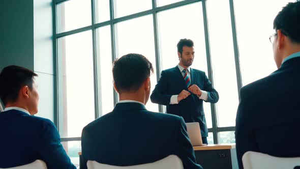 Group of Business People Meeting in a Seminar Conference alt