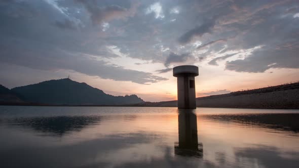 Time lapse reflection sunset Mengkuang dam the largest water capacity in Penang. alt