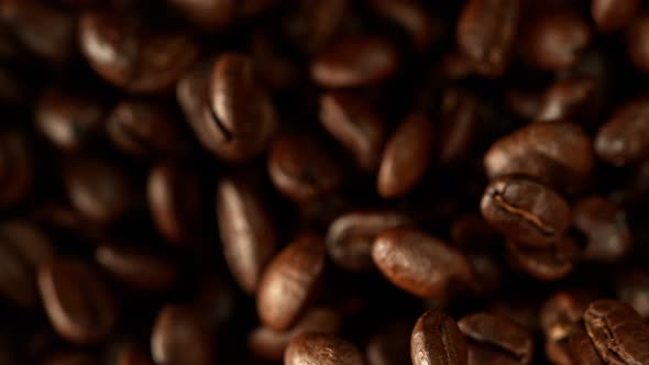 Super Slow Motion Shot of Exploding Premium Coffee Beans Towards the Camera at 1000Fps alt