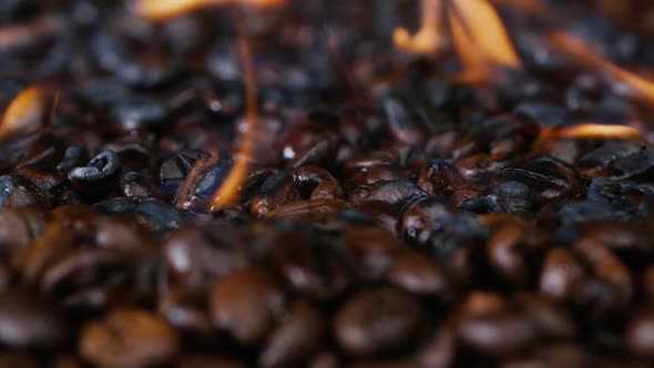 Roasted Black Coffee, Professional Roasting of Beans. Close-up, Preparation of Coffee Beans.