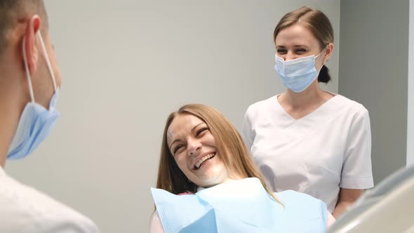 Young Smiling Woman at the Dentist's Reception alt