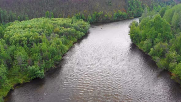 4K Drone Video of slow moving Chena River near Chena Hot Springs, Alaska alt