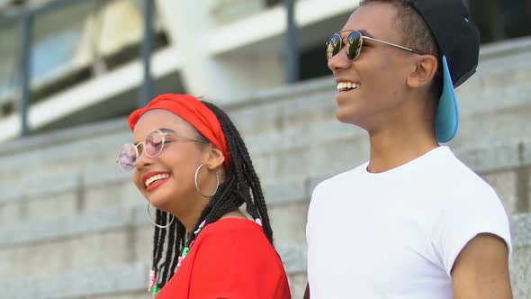 African-American Teen Couple Laughing Outdoors, Enjoying Time Together, Dating alt
