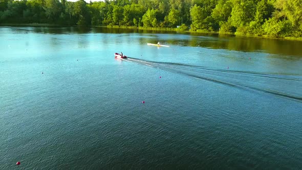 Flying Over the River on a Sunny Bright Day People Resting on Kayaks and Sapa Sun Glare in the