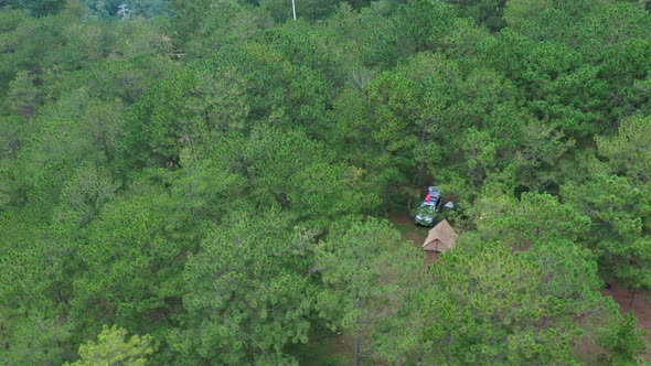 Aerial view of Asian couple camp enjoying