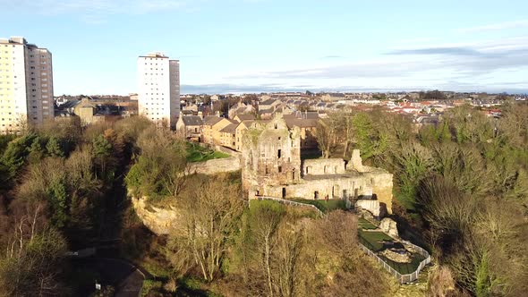 Flight toward medieval Ravenscraig Castle,aerial, Scotland alt