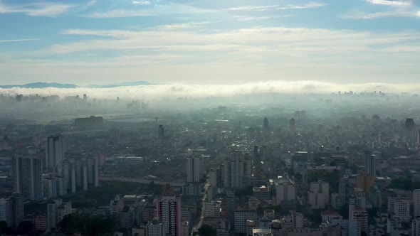 Above the clouds. Sunrise foggy morning. alt