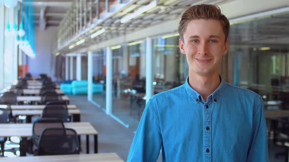 Employee Shows Thumb Up alt