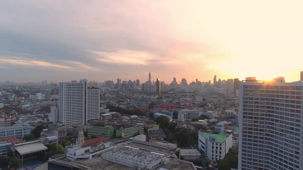 4k Aerial city view of Bangkok dowtnown, Flying over Bangkok, Thailand. alt
