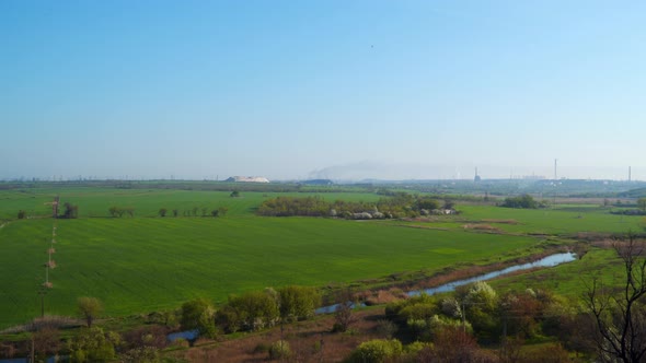 Panoramic view of the field and the river