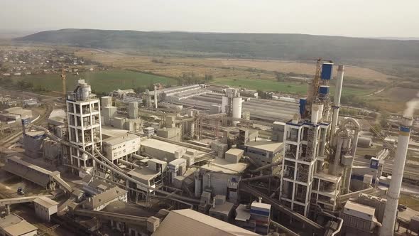Aerial View of Cement Plant Factory at Industrial Production Area alt