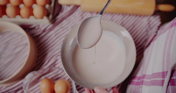 Woman Kneading Dough for Bread alt