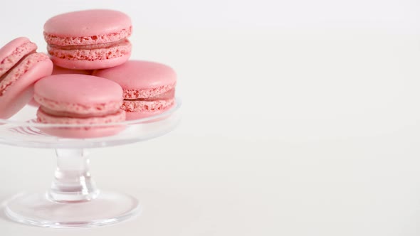 Pink Macarons on Glass Confectionery Stand alt