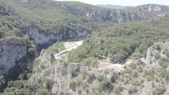 Ungraded Aerial view of Narural arch in Vallon Pont D'arc in Ardeche canyon in France