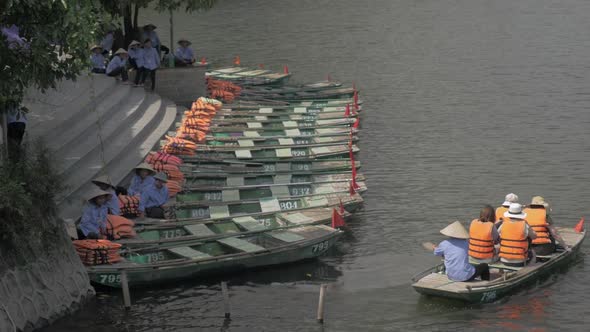 Boat with Tourists Sailing From Mooring, Vietnam alt