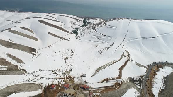 Snowy Mountains And Ski Center Aerial View alt