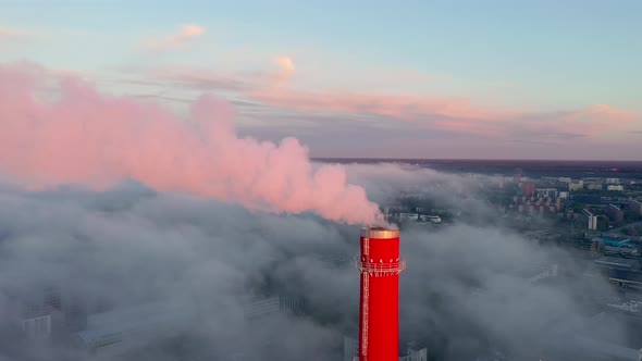 The Tip of the Tall Red Chimney Tower in Tallinn Estonia alt