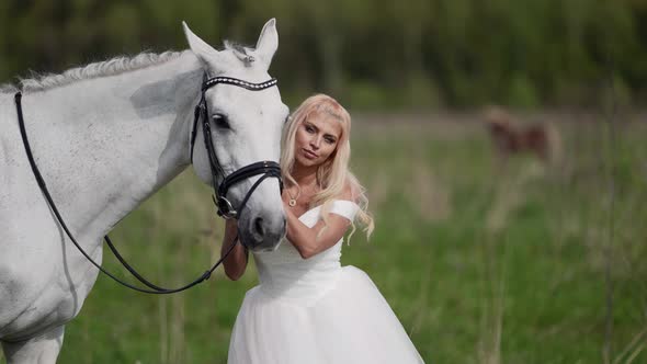 Portrait of a Blonde in a White Dress alt