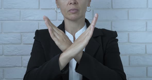 Say no with hands.  alt