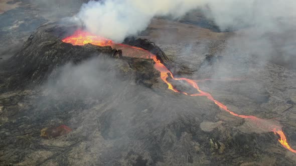 Drone view of Fagradalsfjall volcano crater filled with lava, Iceland alt