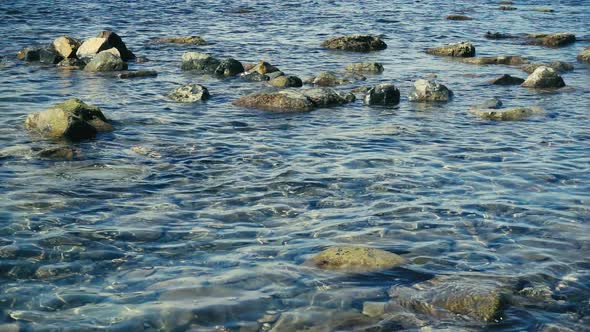 Crystal Clear Water on a Stony Shore 