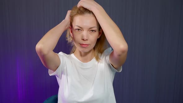 Young Woman Is Massaging Her Head By Hands, Pulling Hair, Anti Headache Massage alt