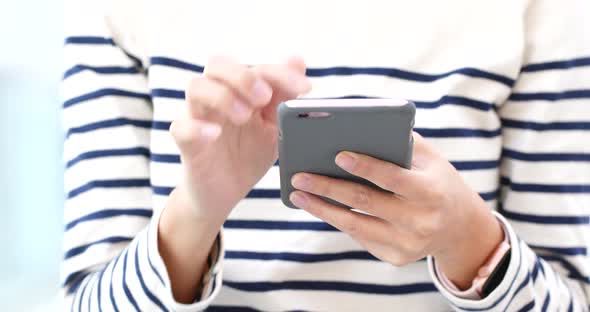 Woman use of smart phone  alt