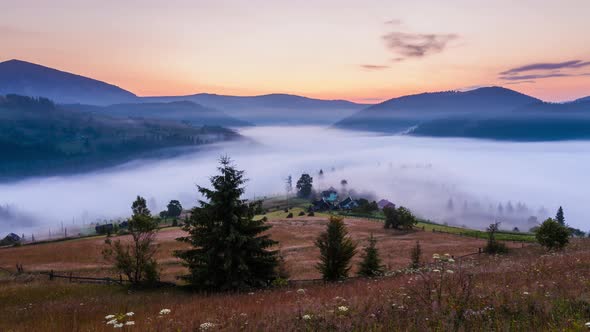 Misty Dawn in the Mountains. Beautiful Autumn Landscape