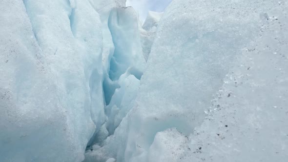 White Ice Inside of a Glacier in an Ice Cave. Steadycam Shot alt