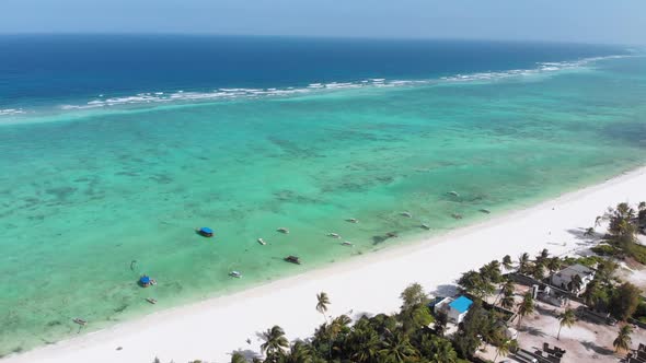Ocean Coastline Barrier Reef By Beach Hotels at Low Tide Zanzibar Aerial View alt