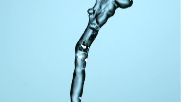 Water pouring and splashing in ultra slow motion 1500fps on a reflective surface - WATER POURS 141 alt