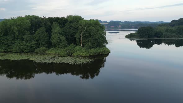 Morning flying over lake before sunrise alt