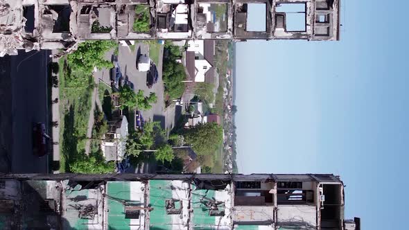 Vertical Video of the Consequences of the War in Ukraine  Burned Cars alt