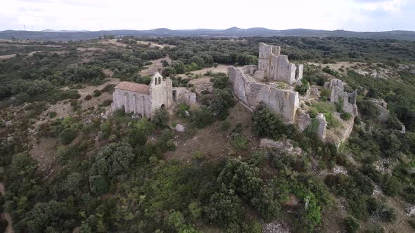 Aerial View of an Abandoned and Old Castle Chateau d'Aumelas in South of France alt