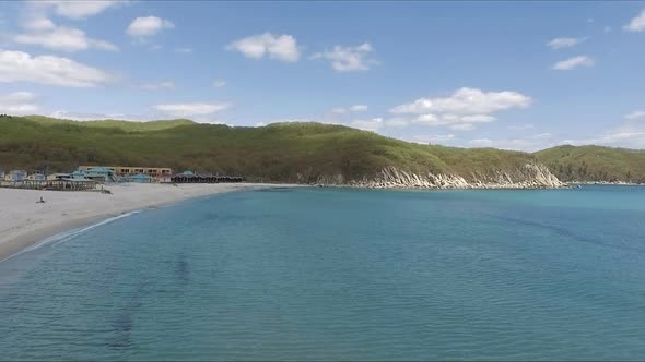 Flying Over the Blue Sea Surface in the Azure Lagoon alt