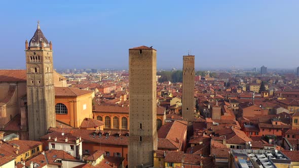 Flight over three towers, center of Bologna, Italy