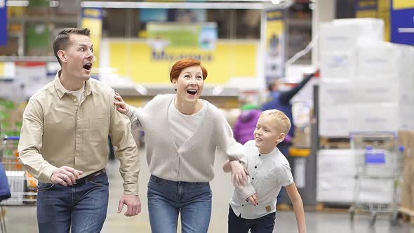 Family with Child Son Run to Discounted Product Hurry Up to Make Purchase