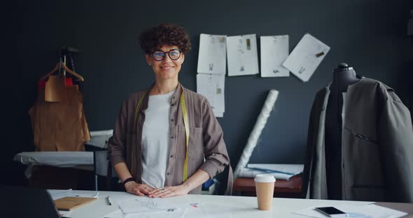 Portrait of Successful Fashion Designer Beautiful Young Woman in Workshop alt