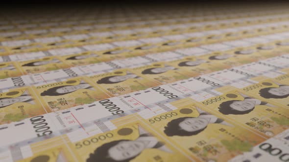 50000 South Korean won bills on money printing machine. alt