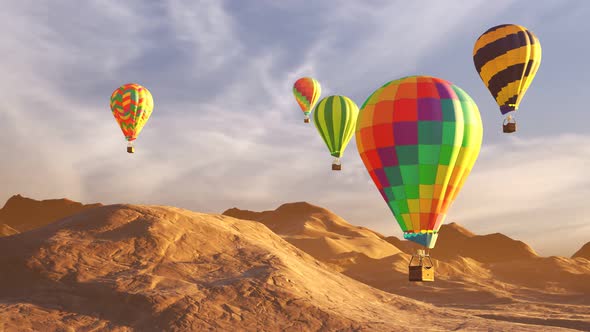 Colorful ho air balloons flying above desert mountain landscape during the day. alt