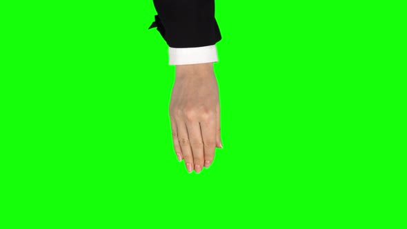 Female Hand in Black Jacket and White Shirt Is Performing 5x Pinch at Tablet Screen Gesture. Chroma alt